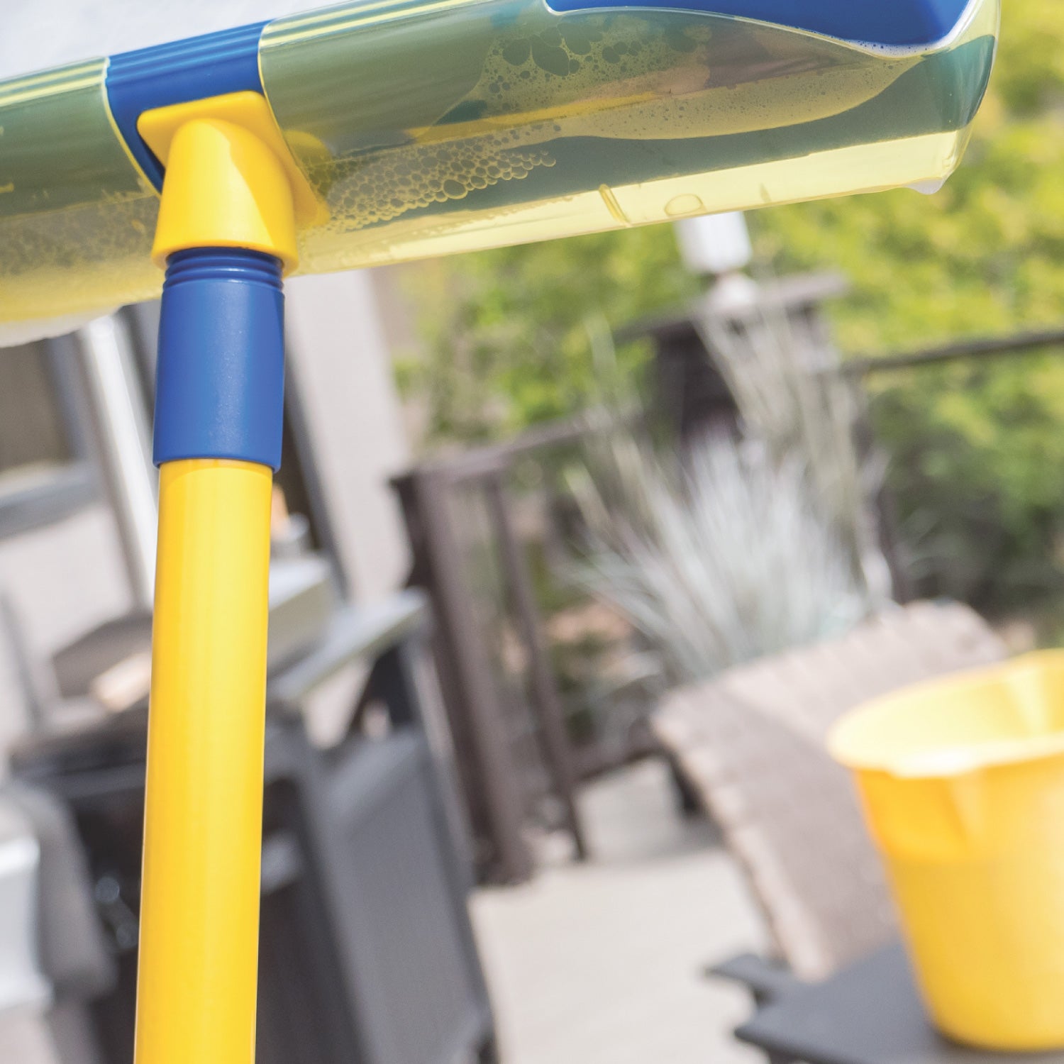 https://www.oceansales.us/cdn/shop/products/AquaBLADE-Extension-Pole-in-Use-patio.jpg?v=1675889262&width=5330